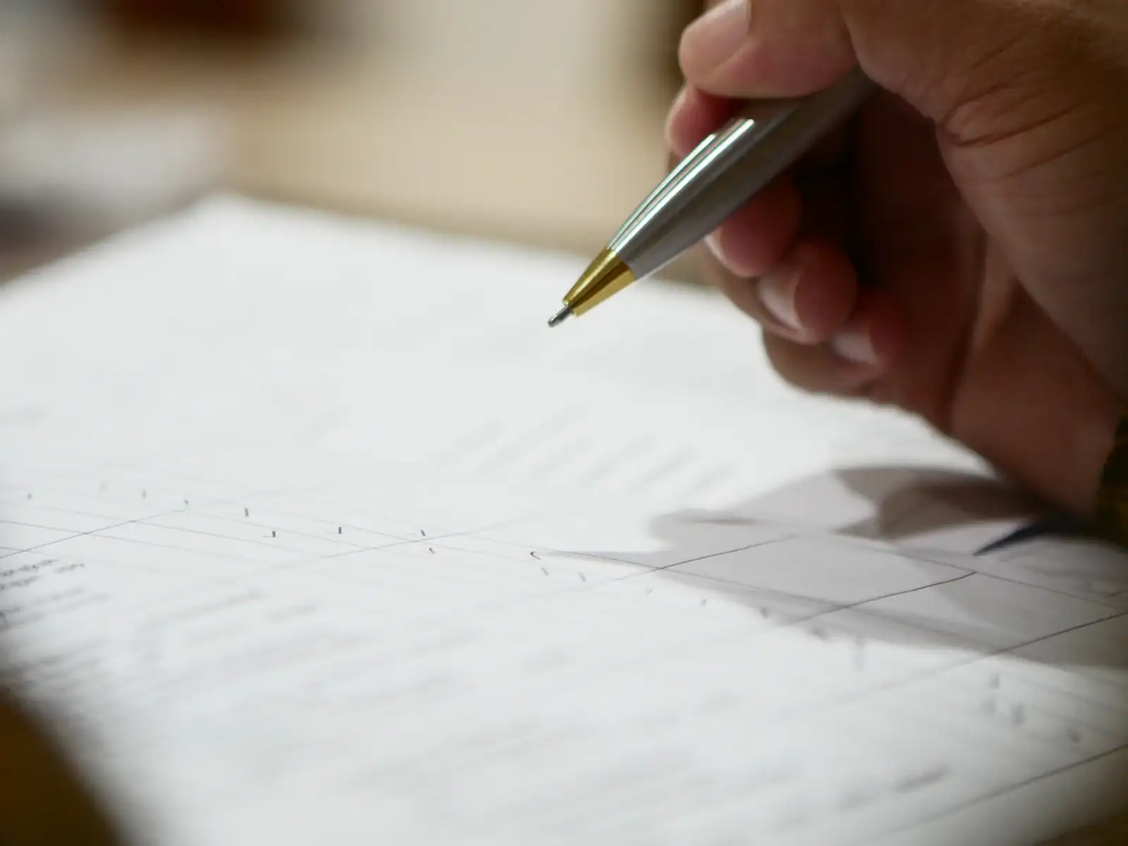 Pen resting on a written page