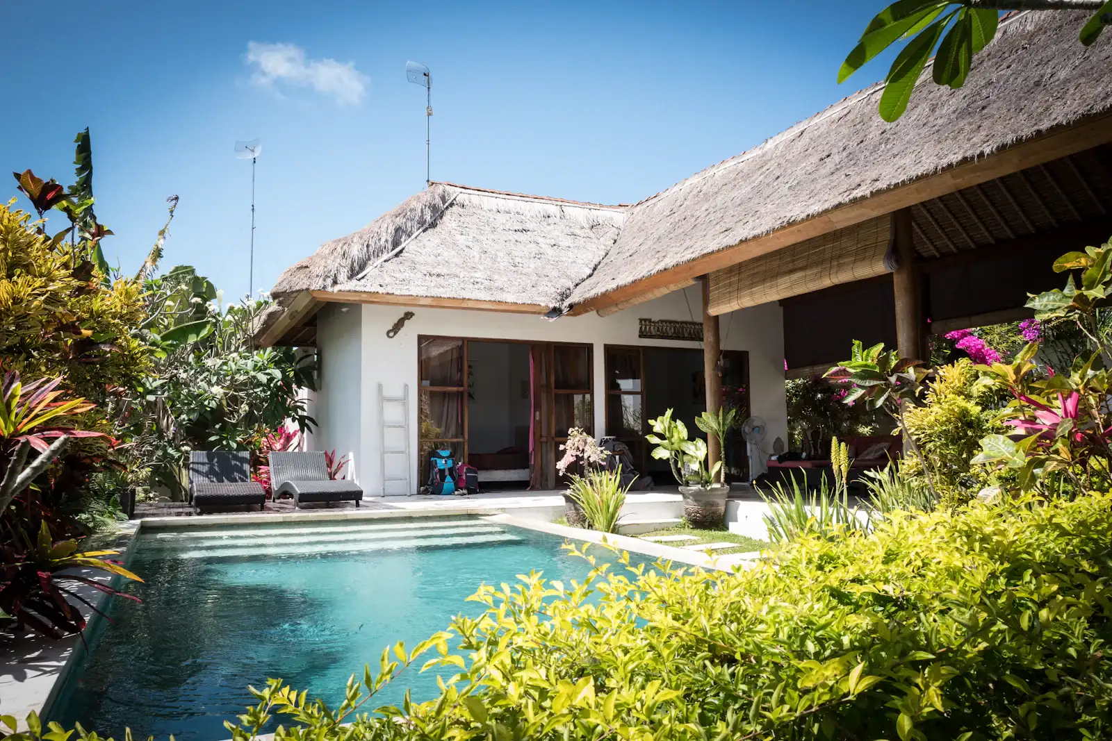 Thatched villa with a pool
